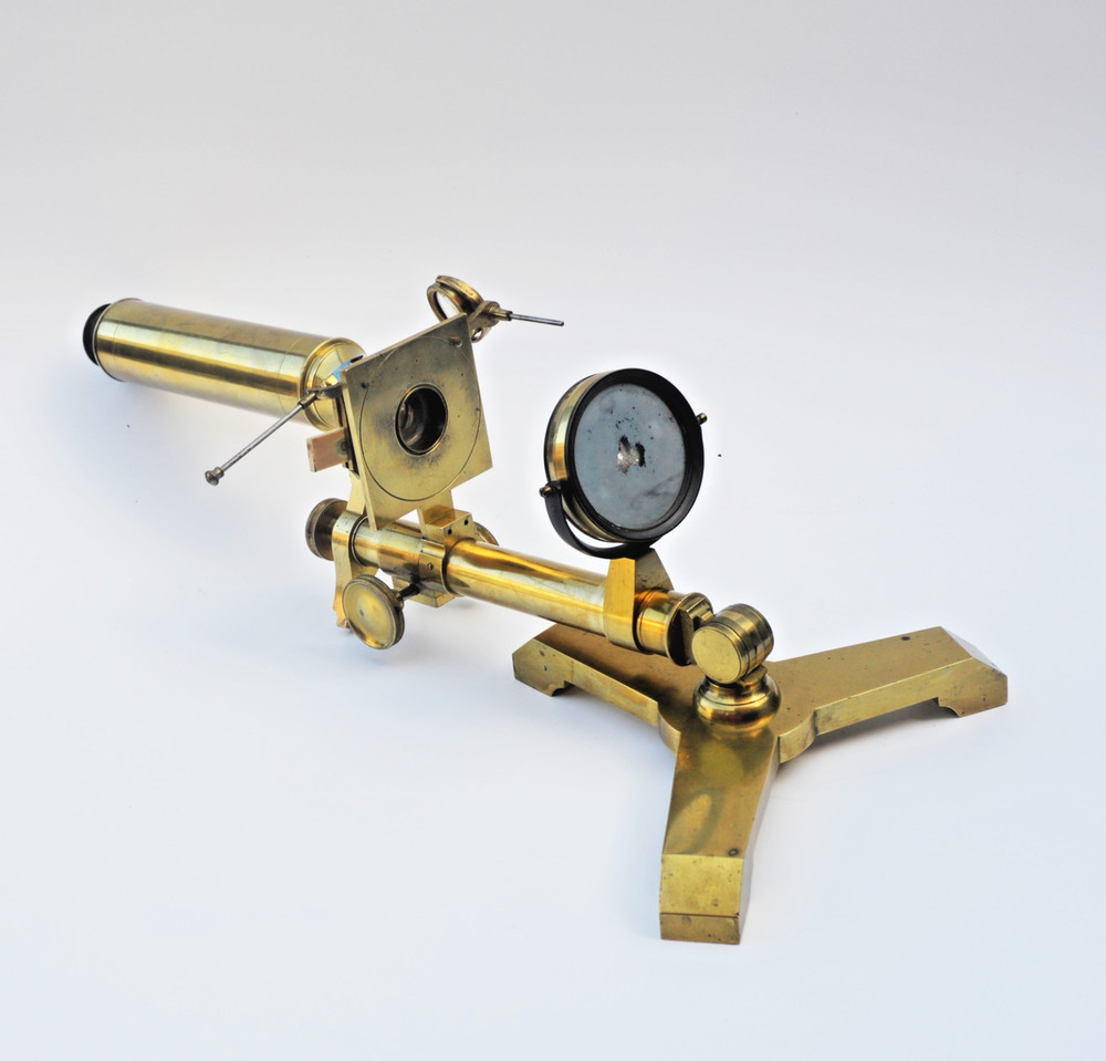 Brass microscope in case.