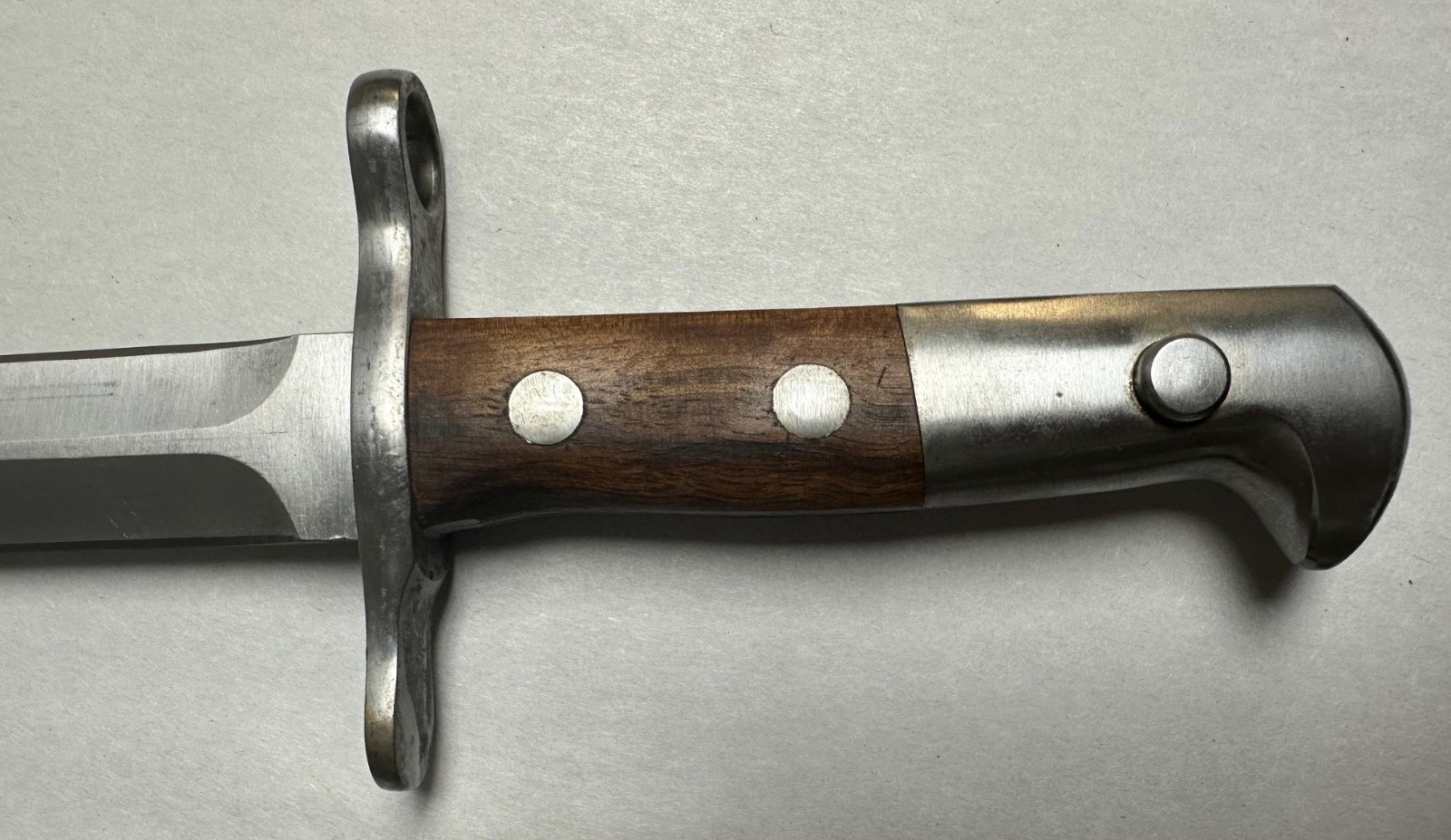 SWISS K31 BAYONET WITH SCABBARD. NEW OLD STOCK.