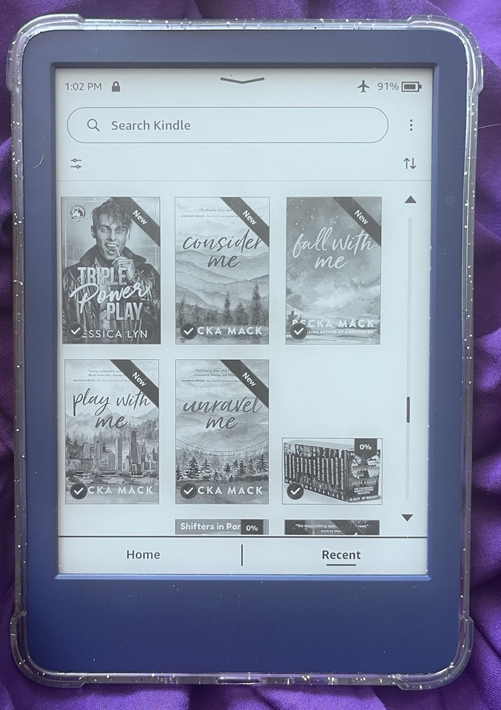 Amazon Kindle ereader Blue with books