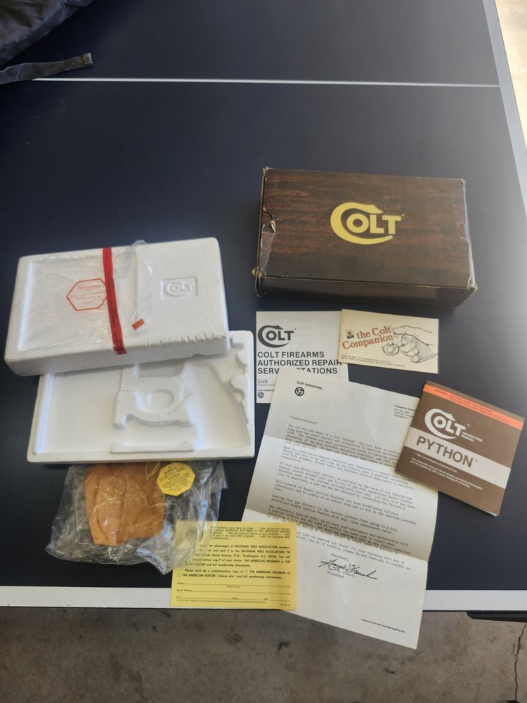 1980's Colt Python 4" Nickel wood grain Box W/ papers