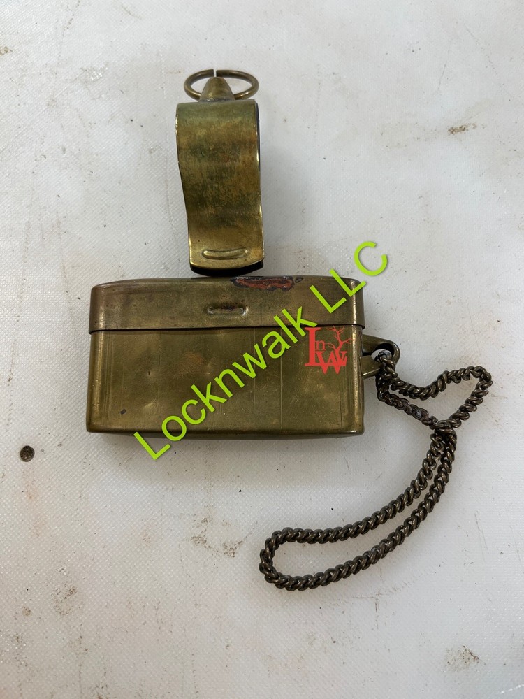W.W. II - SOLID BRASS WHISTLE & vtg brass military match safe w/original chain