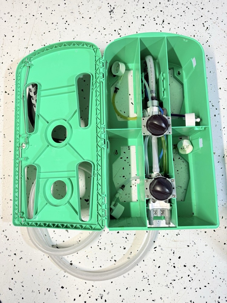 3M Flow Control System chemical dispenser, a wall-mounted.