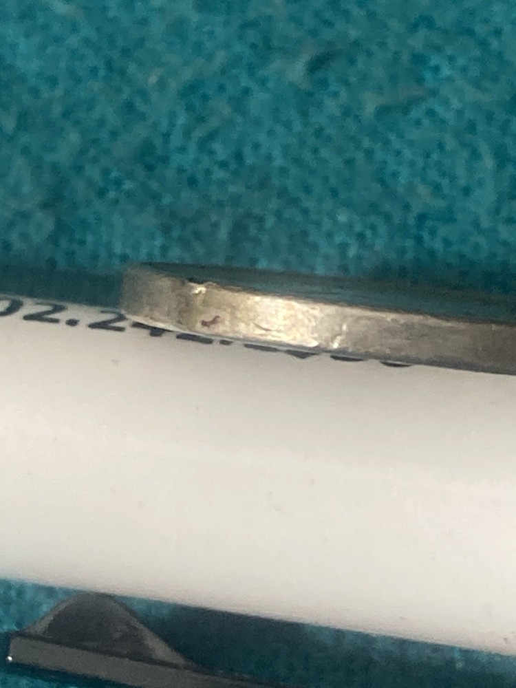 1990P unknown metal retained on rim Well CirculatedRef#A36