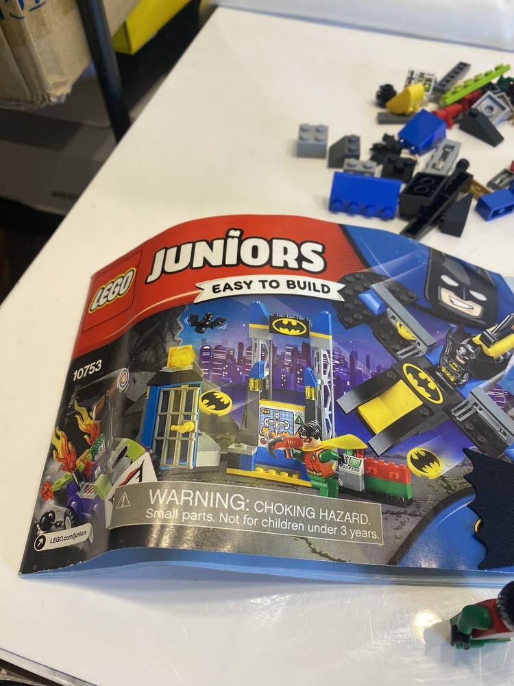 lego blocks and 3 figures with booklet