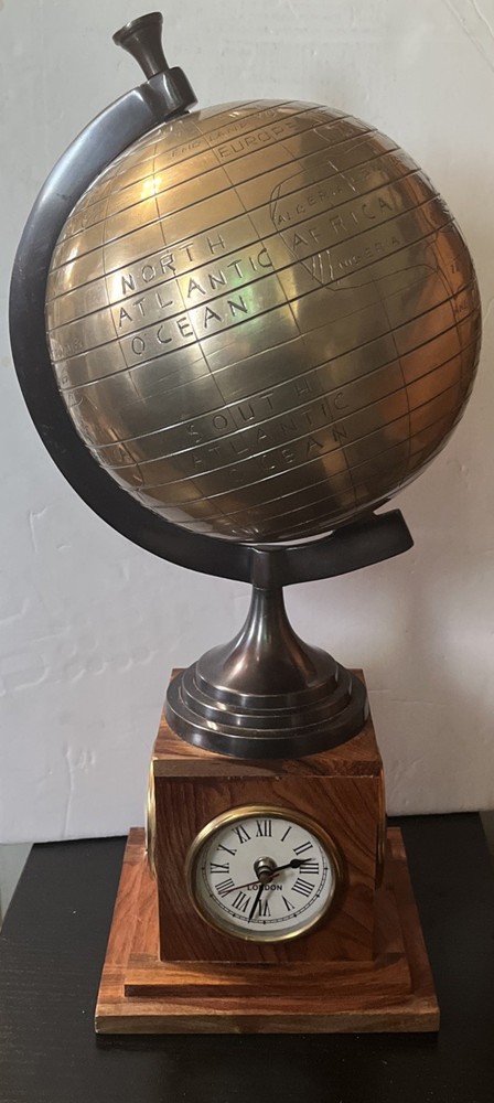 Bains Kushnick Clock Globe