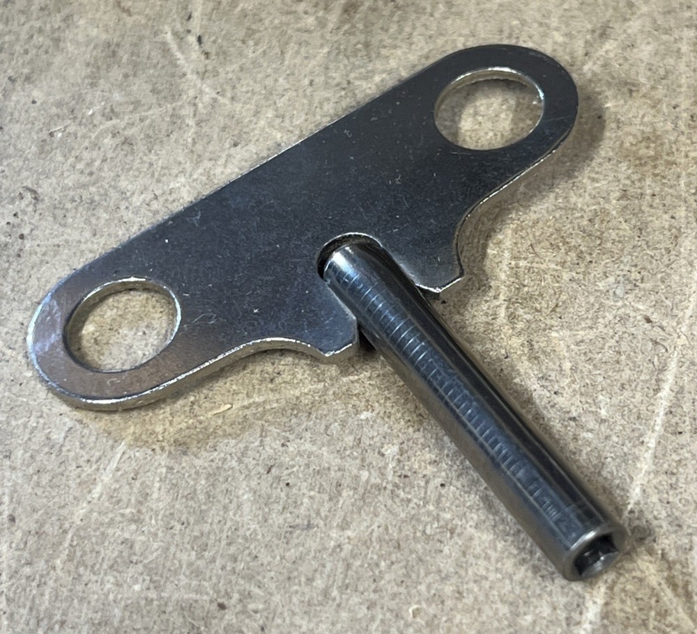 MCM Wind Up Wall Clock - Scroll Design