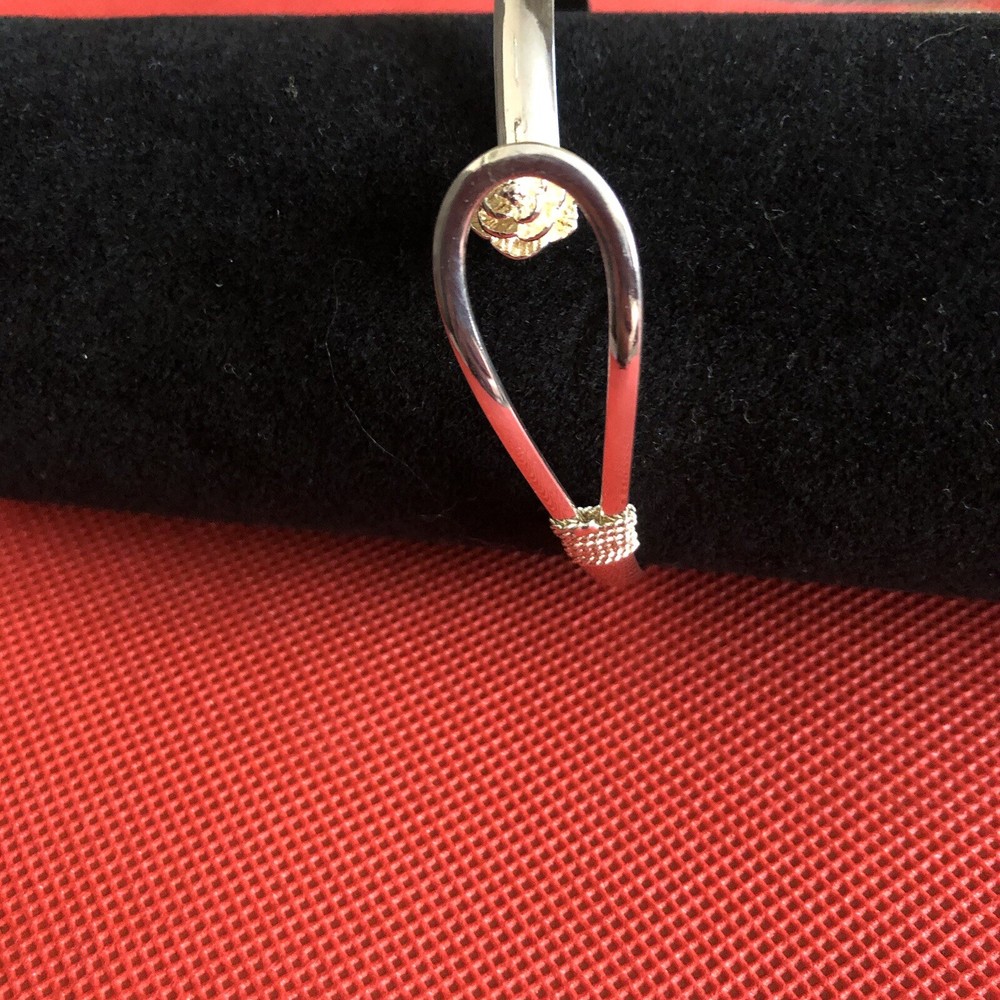 Silver Bangle With A Rose Fixture