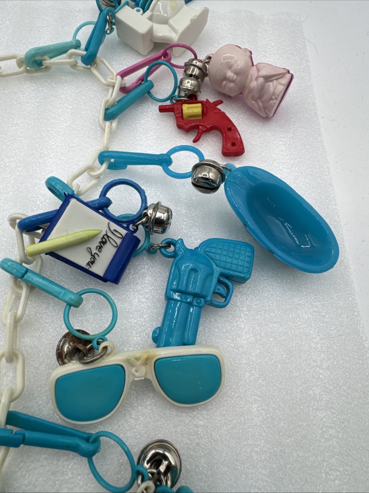 Vintage 1980's Plastic Bell Charm Clip Necklace w 2 Chains and 34 Charms.