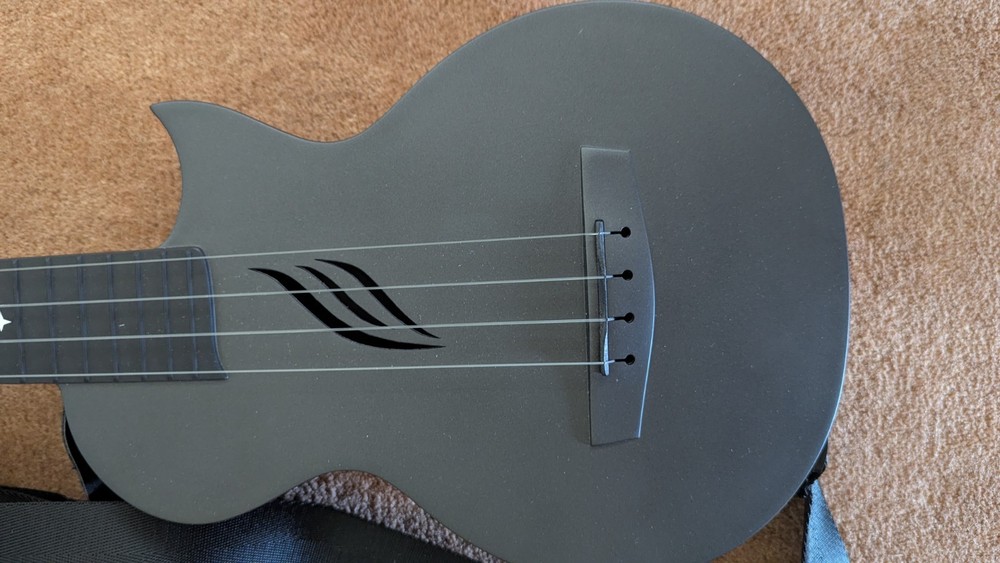 25" Ukulele With Case And Extra Strings