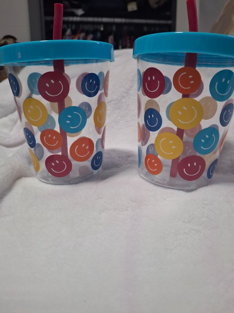 Plastic cups with straws