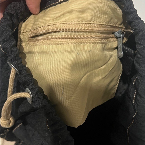 2003 Vintage Kipling Small Black Backpack with Tan Drawstrings