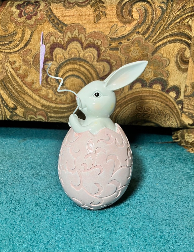 porcelain Bunny in Easter Egg holding butterfly