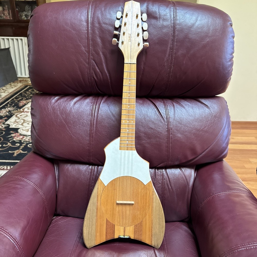 8-string Tahitian Ukulele. Model Featuring A Turtle-shaped Body. Used