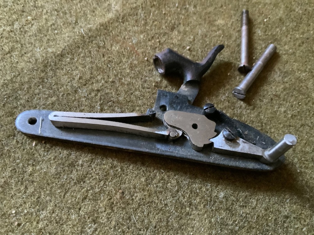 Percussion lock with screws