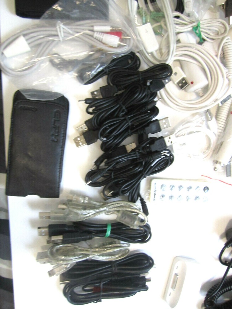 Lot of electronics, Assorted camera straps , Assorted cables and more ZZ