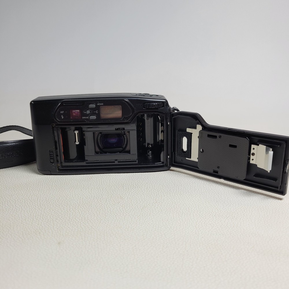 Pentax 900 35mm Autofocus With Strap...UNTESTED