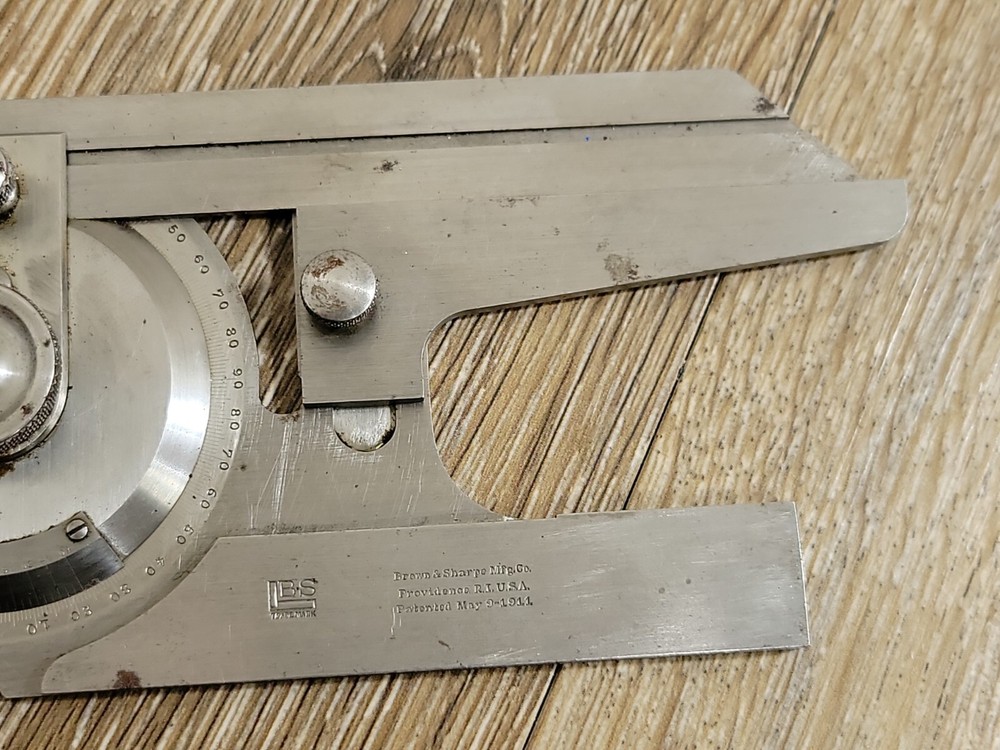ABROWN & SHARPE UNIVERSAL BEVEL PROTRACTOR (Micrometer Protractor) May 9, 1911