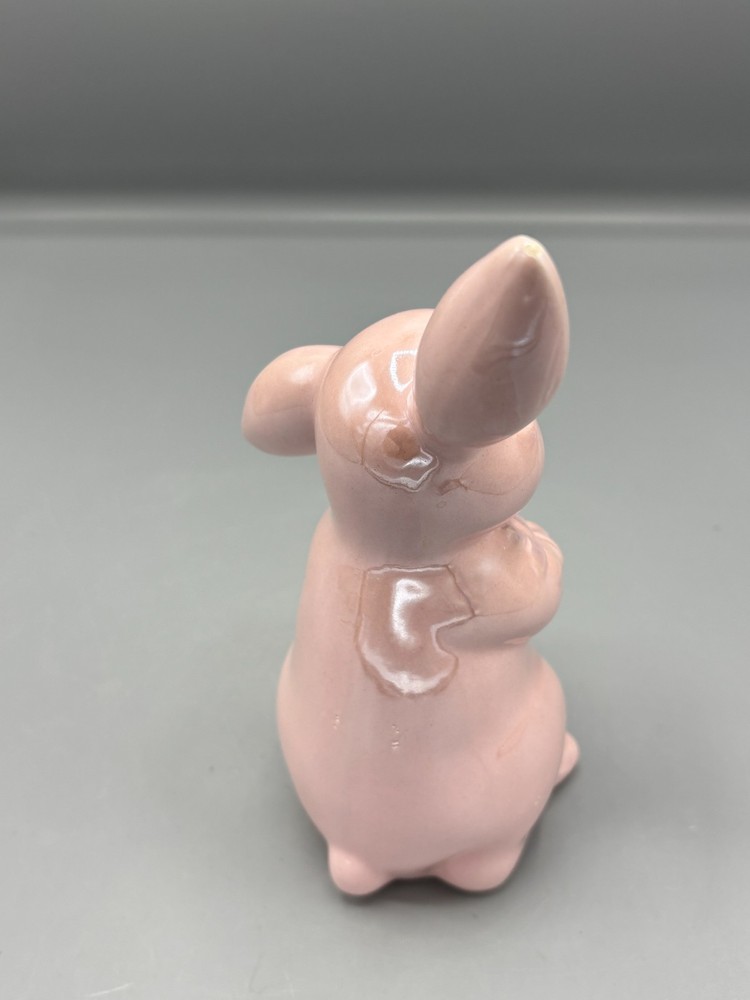 Glossy pink ceramic Easter bunny with carrot