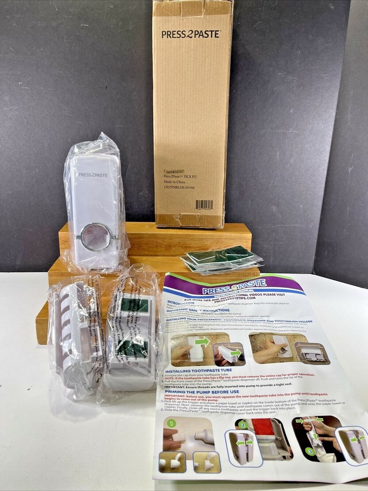 NOS RC Press to Paste -toothbrush holder and toothpaste dispenser