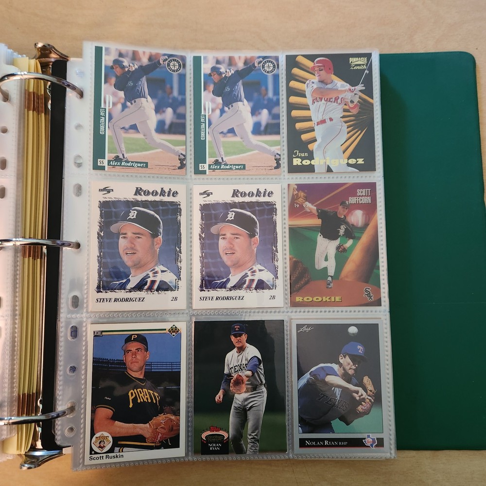 various baseball cards in great condition in binder sheets