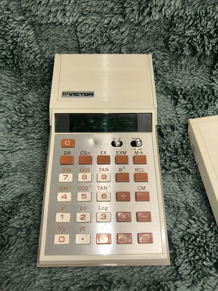 vintage Victor handheld electronic calculator-UNTESTED
