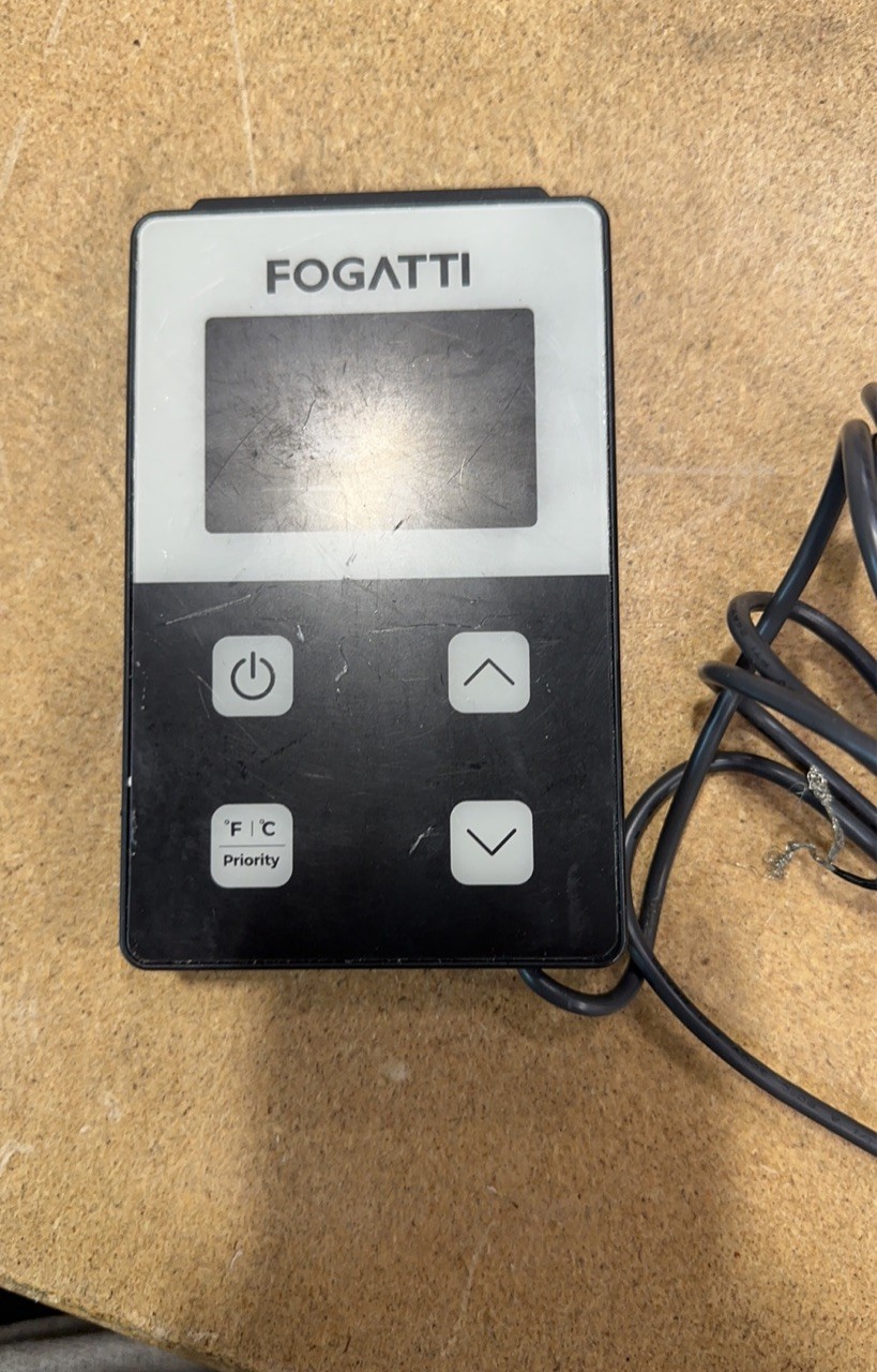 Used 2.5GPM 48,000 BTU RV Tankless Water Heater with 15x15 White Door