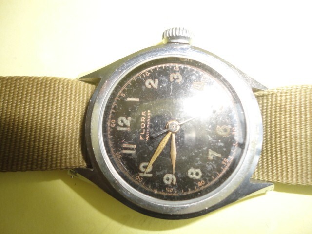 G.I. WRISTWATCH, RUNS WELL, FLORA BRAND