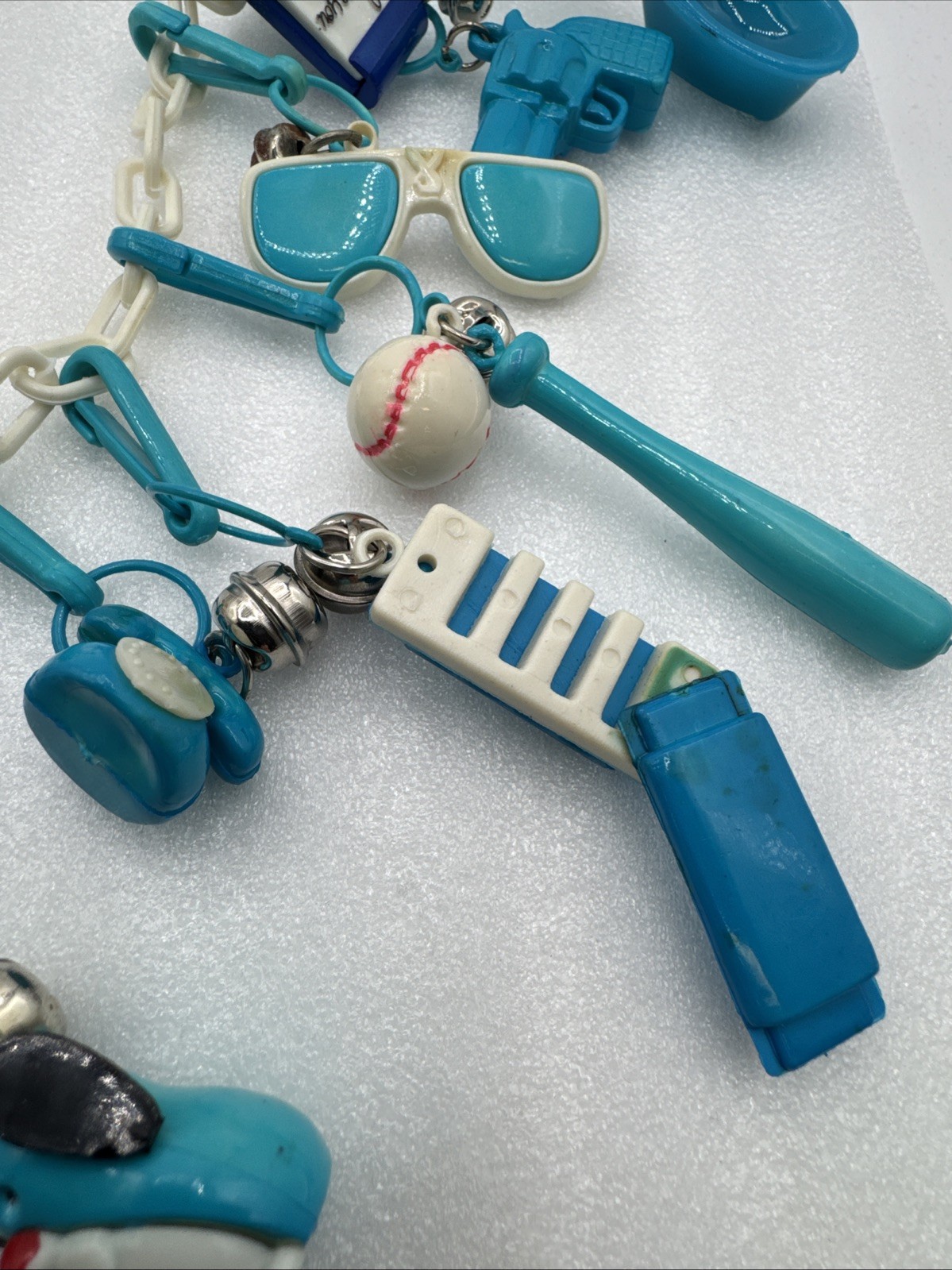 Vintage 1980's Plastic Bell Charm Clip Necklace w 2 Chains and 34 Charms.