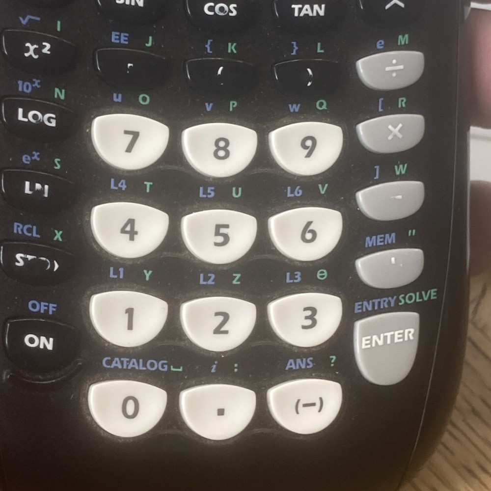 Texas Instruments TI-84 Plus Graphing Calculator and Cover