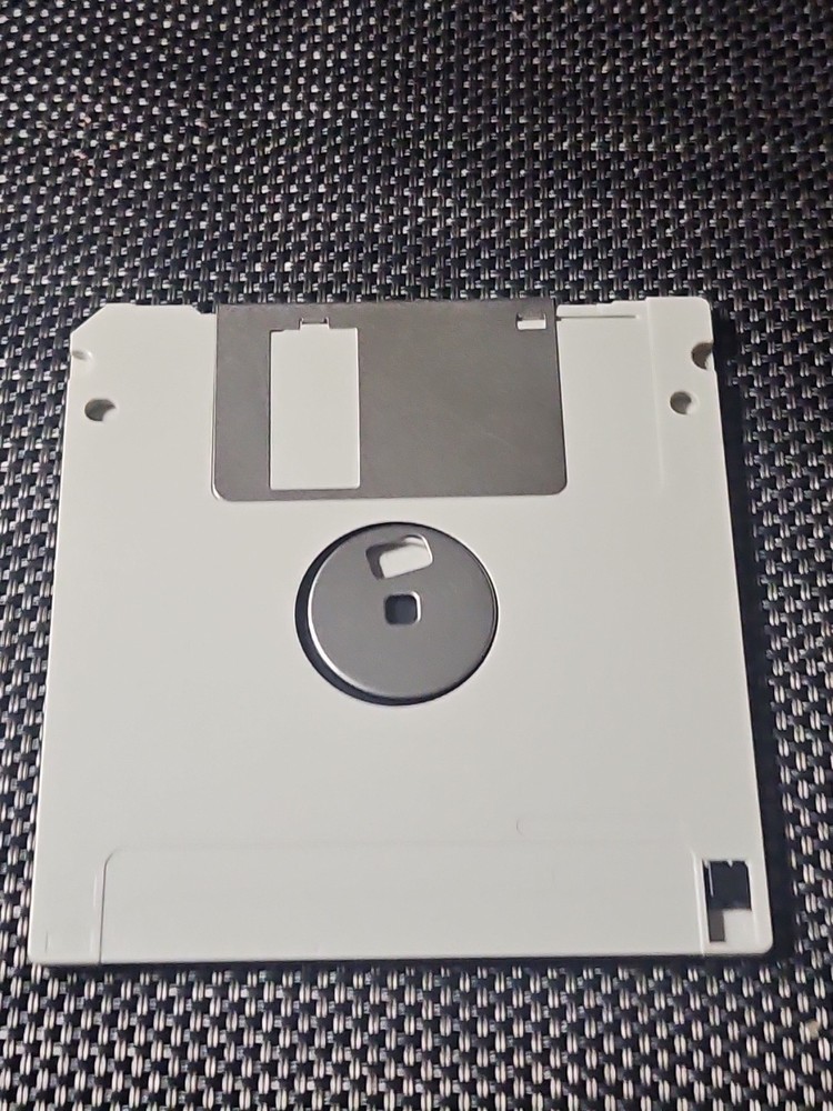 5.25" floppy disk labeled "Disk 1/2 Mouse Driver 155159-01 Untested Buying As Is
