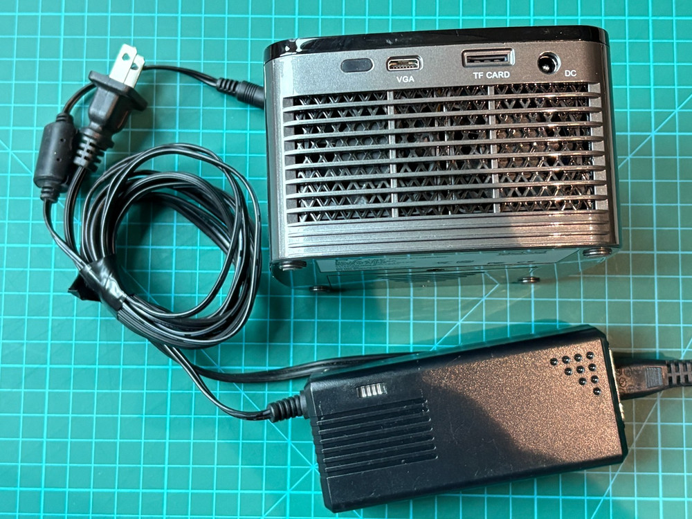 AAXA P7 Native 1080p Mini LED Projector. Great plugged in.
