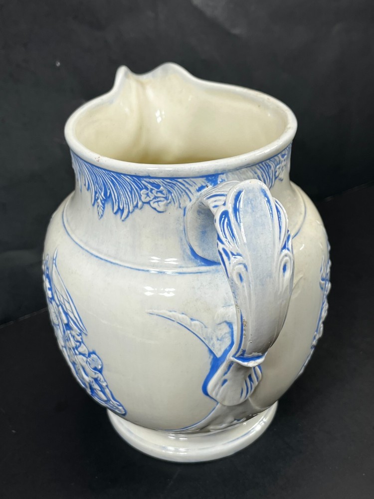 Christopher Colombus Studio Barna's Pottery Pitcher Blue White Relief Scene
