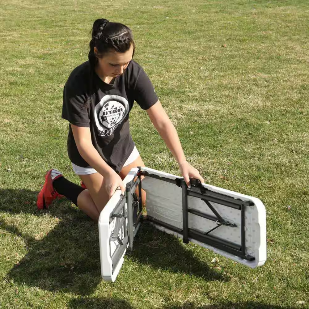 White Outdoor 6 Ft. Fold-In-Half Folding Bench.