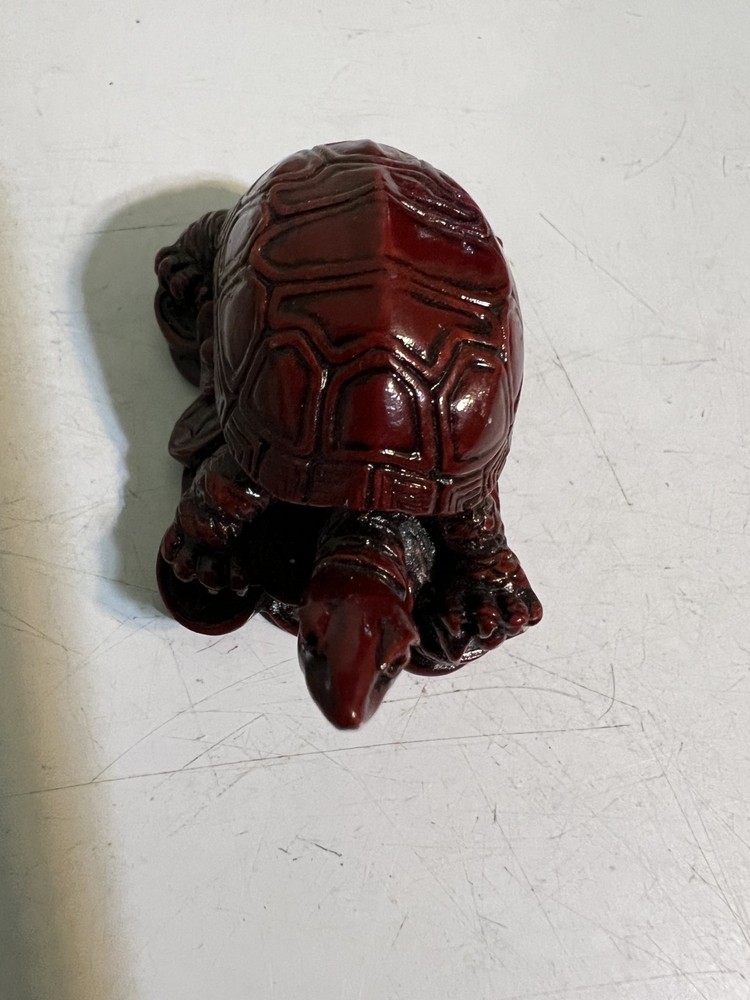Tiny unique red brown turtle figurine