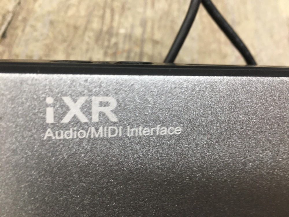 Tascam iXR USB Audio/MIDI Interface With iOS Connectivity and cable.