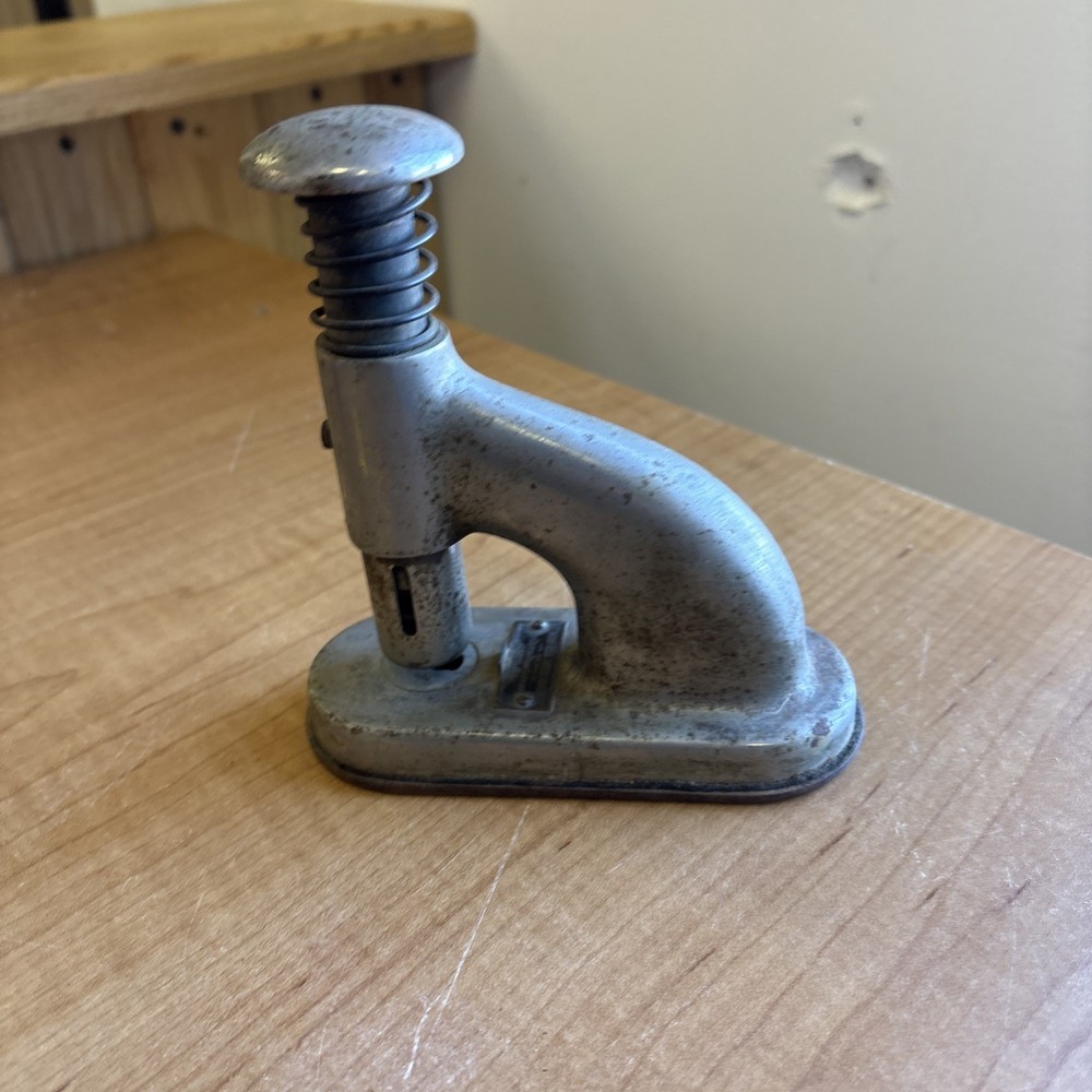 The Clipless Stand Machine - The Clipless Paper Fastener Co. - Newton, Iowa