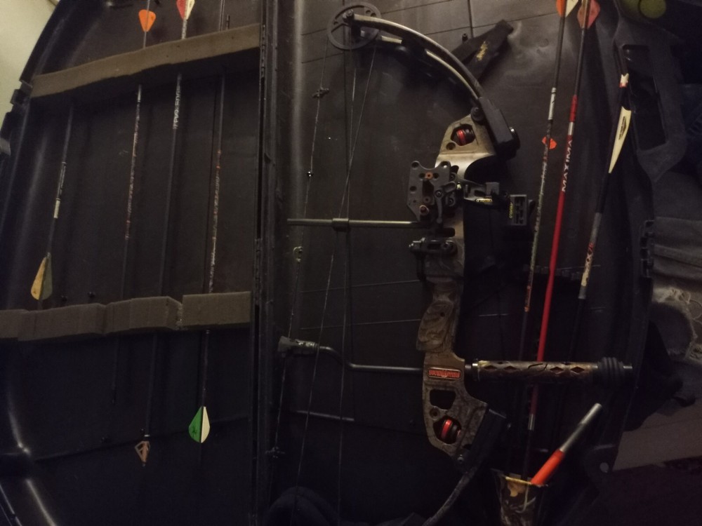 Buckmaster bow and 6 arrows