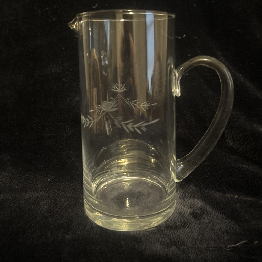 This is a vintage etched glass pitcher with a wheat pattern.