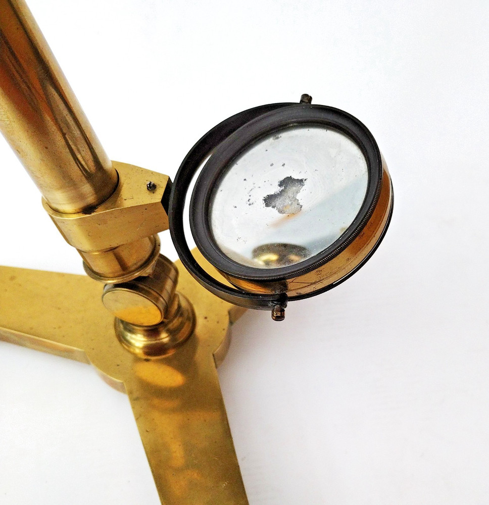 Brass microscope in case.