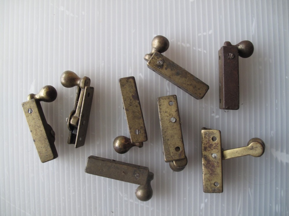 Eight heavy brass vintage window fasteners / sash locks