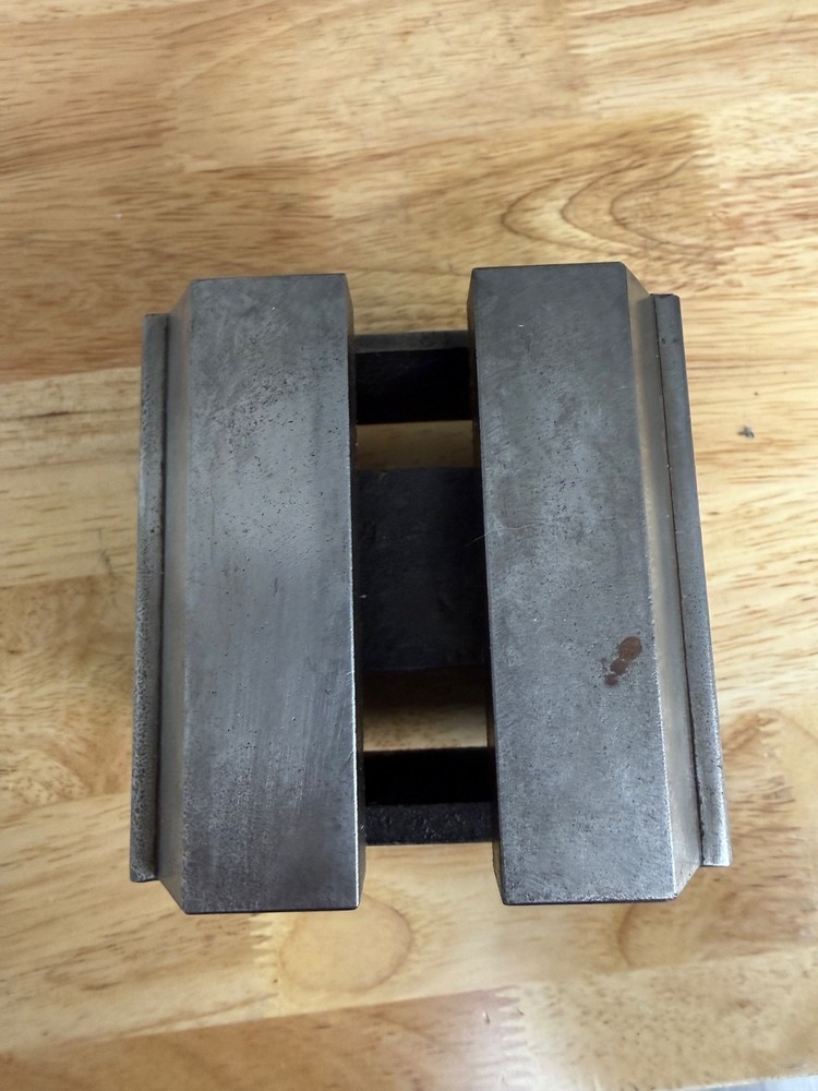 Slotted steel riser block