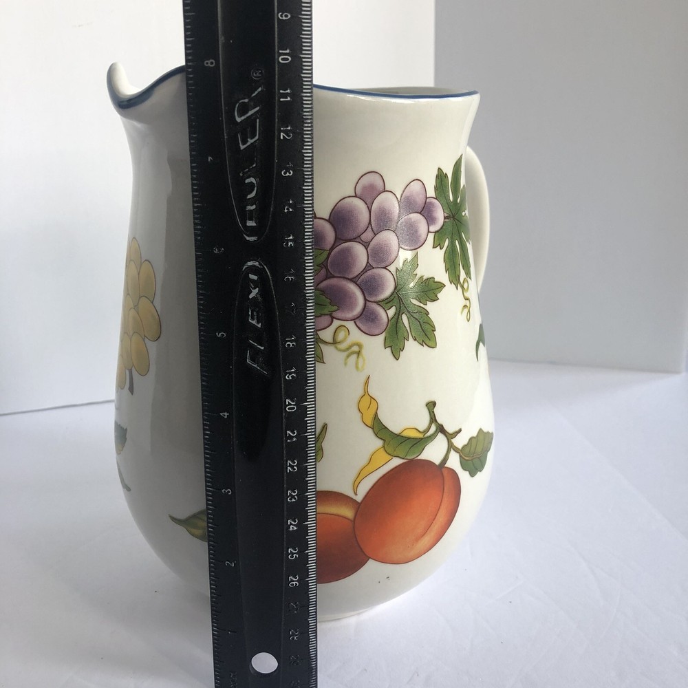 Tabletops Unlimited Essence Pitcher 76 Oz Stoneware Fruit Design White Multi 8"