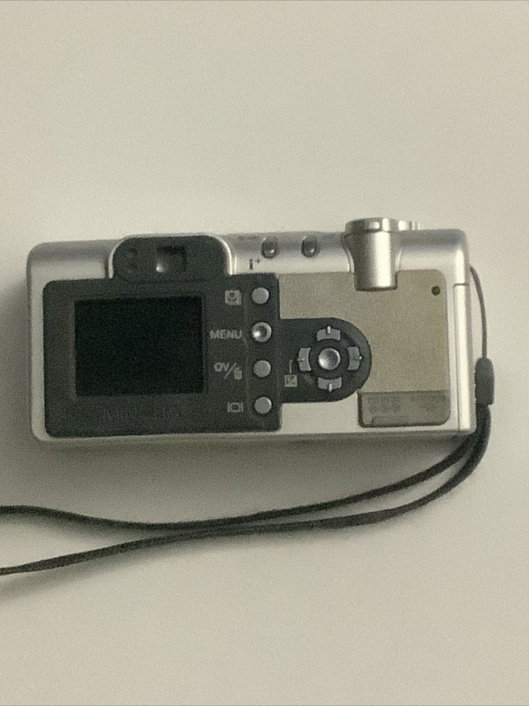 Minolta Konica DiMAGE F200 4.0MP Digital Camera - Silver - Powers On - Read