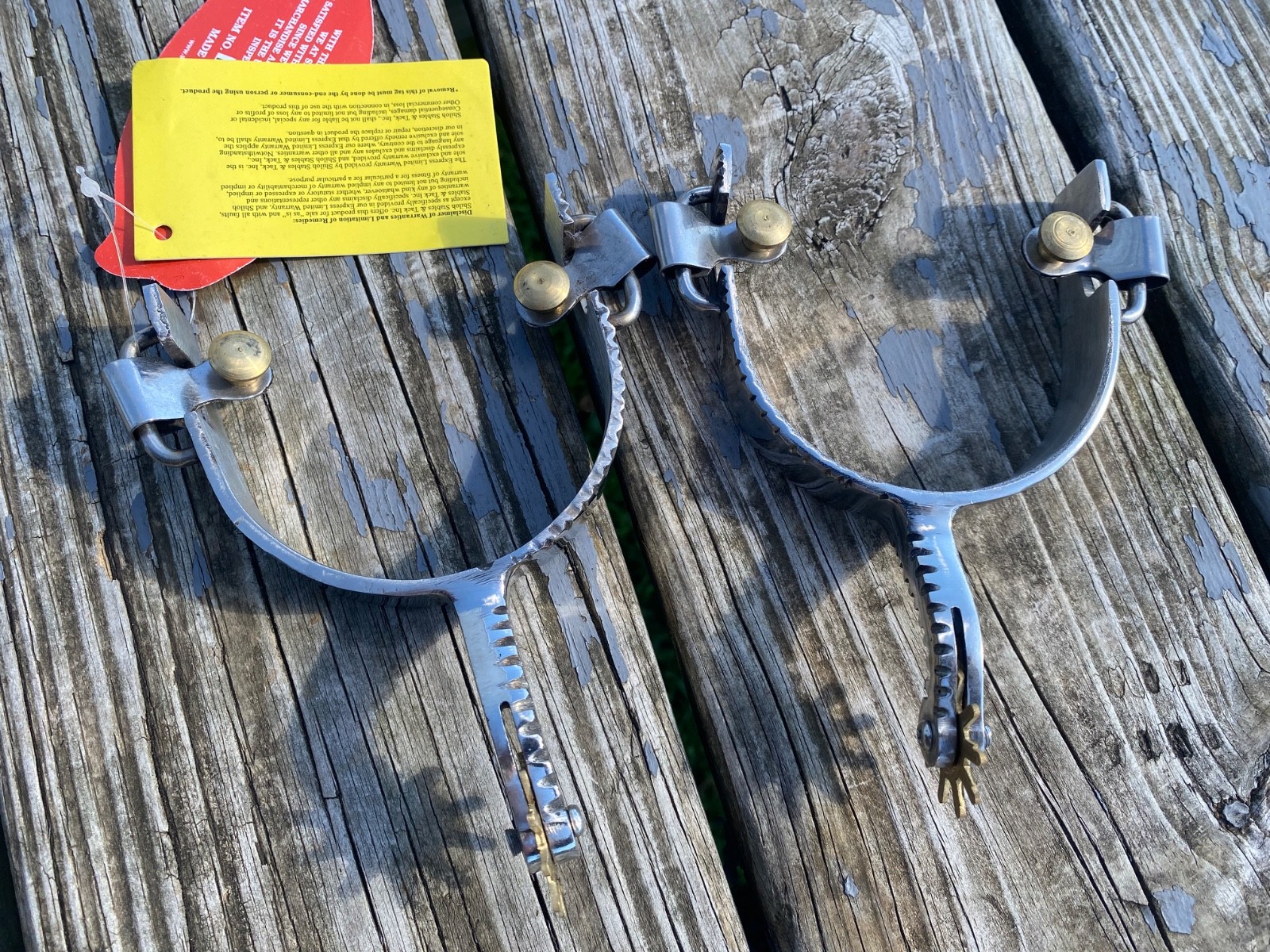 Men's notched edge design SS Western spurs w/brass buttons, 10 pt rowel