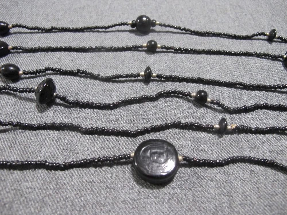 Vintage flapper style assorted black glass + tiny silvertone beaded necklace