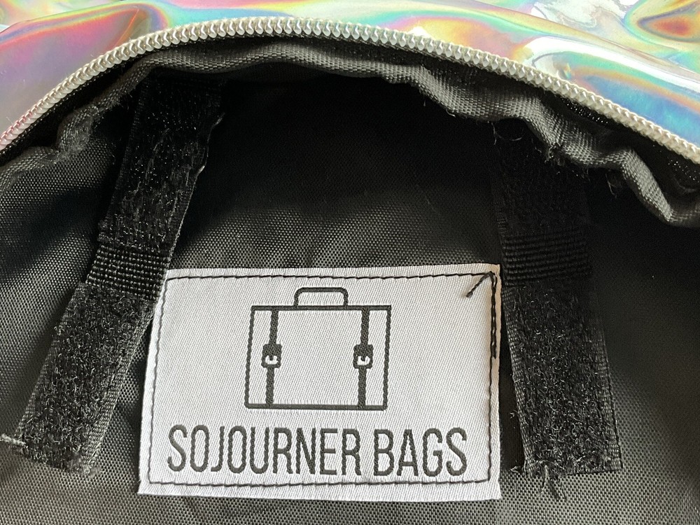 Sojourner Silver SLIM BACKPACK Pack Hiking Running Biking As Is Read