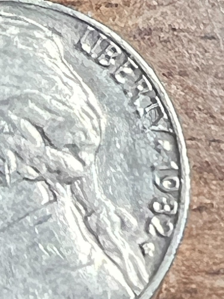 1982 ERROR JEFFERSON NICKEL STRUCK THROUGH AN OBJECT