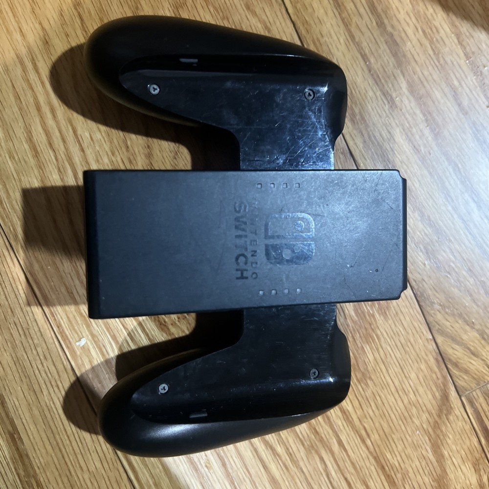 Nintendo Switch Console W/ Dock, Joycon Grip, & Joycons “READ”