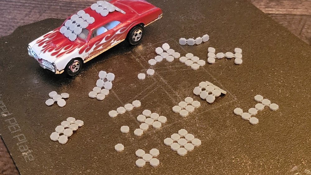 Bendable Reflective Armor 3d printed. 1/64 scale. Car not for sale.
