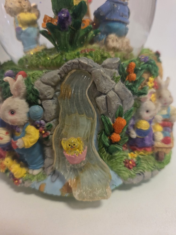 Springtime/Easter musical egg shaped glitter globe plays "Easter Parade"